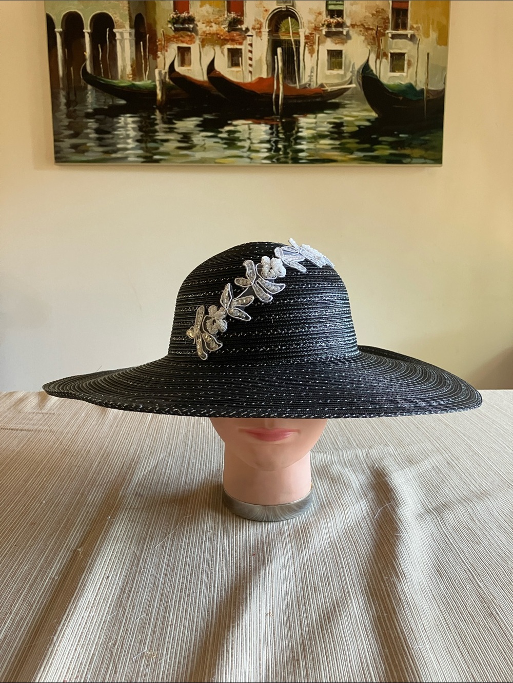 Chic Black and Metallic Silver Wide-Brim Hat with White Floral Sequined Accent